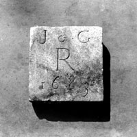 square stone block inscribed 'J & G R 1683'