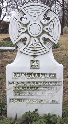 headstone of James Edwin Love: fancy Celtic interlaced carvings in the shape of a cross