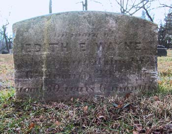 low simple burial stone of Edith E. Wayne