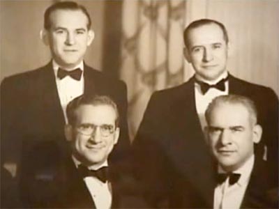 four men in formal attire