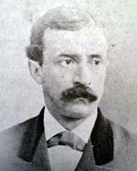 formal head and shoulders, head turned slightly left, with mustache, no sideburns or beard