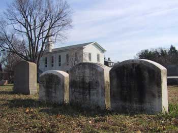 four 19th-century stones, Gladwyne Methodist church in the background