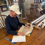 A volunteer reviews a map